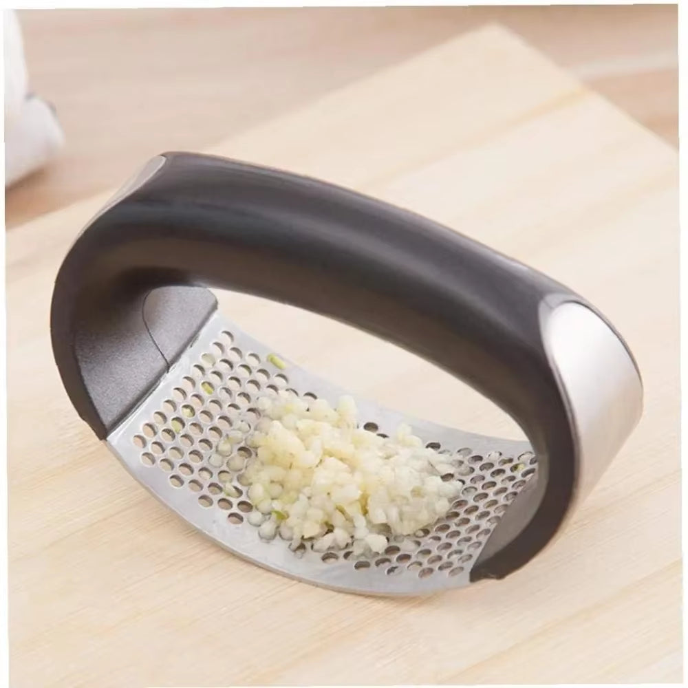 Stainless steel garlic press with ergonomic handles